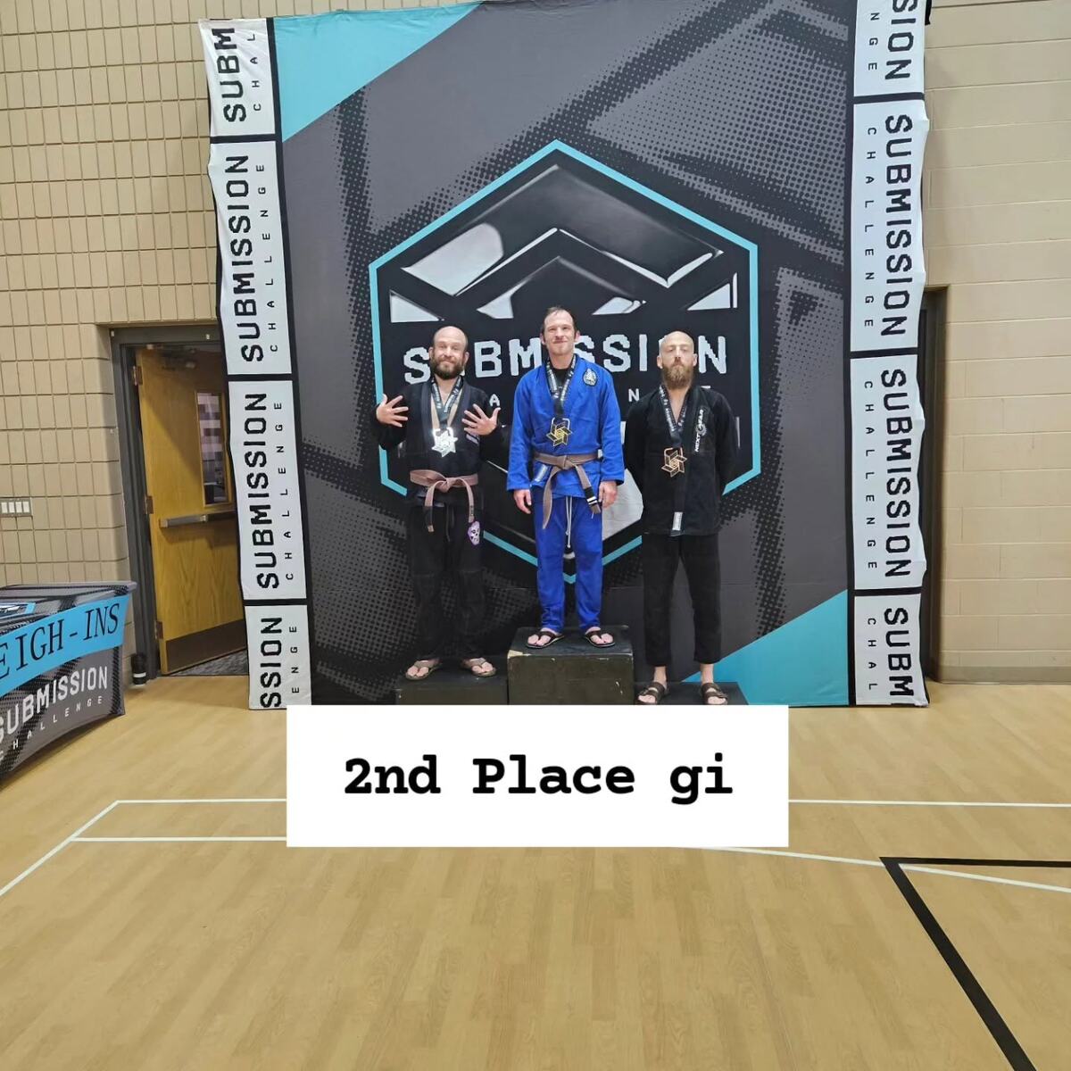 Sawyer taking second place on the adult gi podium at the Submission Challenge