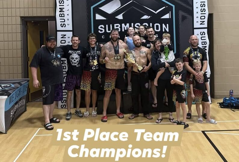 The Misfits team with the Submission Challenge first place team trophy